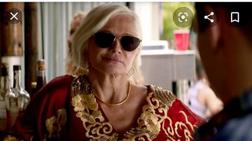 Red and gold chinese full length caftan worn by Smurf (Ellen Barkin) in Animal Kingdom (S04)