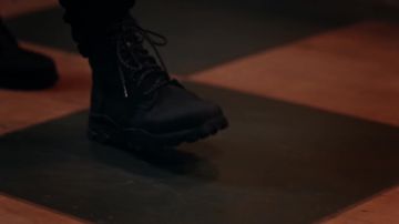 Black leather boots worn by Lefa in his FAME new album teaser video