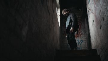 The vest is open with straps worn by Scarlxrd in her video clip KING, SCAR.