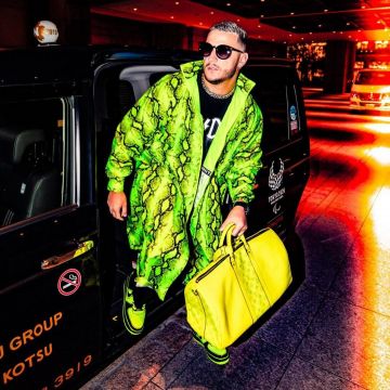 Green cloak jacket worn by DJ Snake on his Instagram account @djsnake