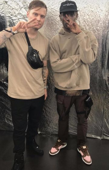 The sweatshirt brown Nike worn by Travis Scott on a post to Instagram of @caminotv