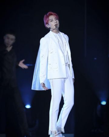 White pants with pearl worn by Suga from BTS on the Instagram account @suga__ibighit