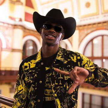 Harrington style jacket in black and yellow worn by Lil Nas X at TN: Spotify House at CMA Fest - Day 1