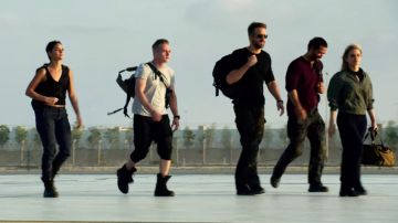 Black backpack worn by by Four (Ben Hardy) as seen in 6 Underground