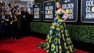 Green dress with yellow flowers worn by Taylor Swift at Golden Globes Awards January 2020