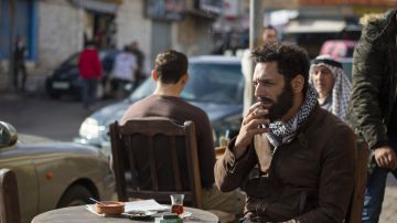 Brown leather jacket worn by Aviram Dahan (Tomer Sisley) as seen in Messiah Season 1