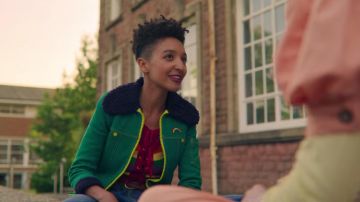 Green rainbow jacket worn by Ola Nyman (Patricia Allison) in Sex Education (S02E02)