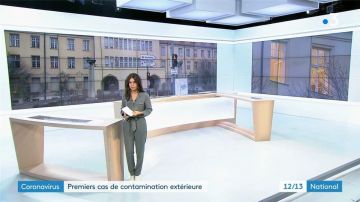 La combinaison gris vert de Emilie Tran Nguyen dans le journal 12/13 de France 3 du 28 janvier 2020