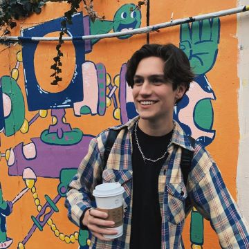 The plaid shirt worn by Chase Hudson on the account Instagram of @lilhuddy