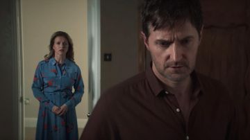 The blue dress printed carried by Corrine Price (Dervla Kirwan) in the series of Intimidation (S01E01)