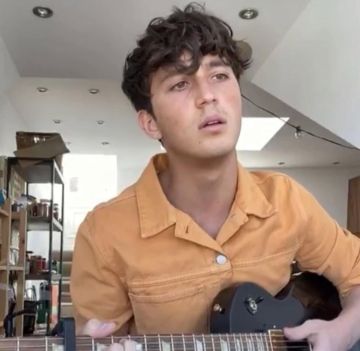 Orange Jean jacket worn by Zak Abel on his Instagram account @zakabel