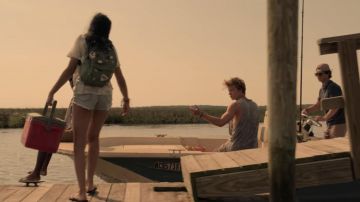 Olive green backpack worn by Kiara (Madison Bailey) in Outer Banks (S01E01)