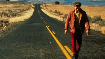 The jacket with bright red lining beige velvet worn by Mike Waters (River Phoenix) in the movie My Own Private Idaho