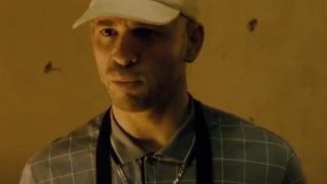 The grey polo and white lines of Mousten (Franck Gastambide) in The Noog