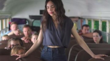 Blue cross-over top worn by April (Sofia Carson) in Feel the Beat