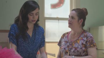 Blue polka dot dress worn by April (Sofia Carson) in Feel the Beat