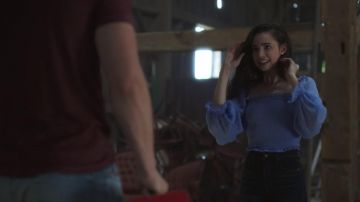 The top blue sleeve of April (Sofia Carson) in the film Feel the Beat