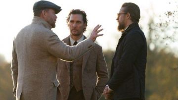 The wool coat worn by (Guy Ritchie) while directing The Gentlemen