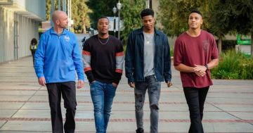 Faded grey wash, ripped skinny jeans  worn by Darnell Hayes D' Vinchi in All Americanp