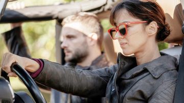 Dark brown leather moto jacket (or distressed black? what is it?) two snaps on either side, padding on the arms, zip up to the side. of Huck (Annet Mahendru) in The Walking Dead: World Beyond (S01E01)