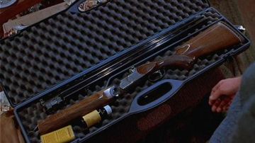 Rifle of Stathis Borans (John Getz) in The Fly