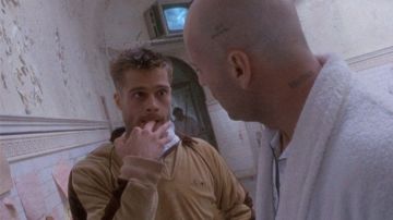 Tan track half with dark brown collar or normal jacket of Jeffrey Goines (Brad Pitt) in Twelve Monkeys