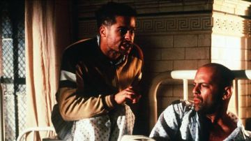 Tan track with dark brown and white elements,zipper jacket of Jeffrey Goines (Brad Pitt) in Twelve Monkeys