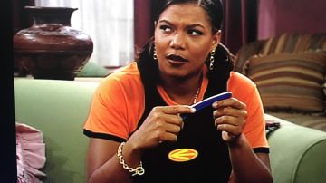 Orange and Black top worn by Khadijah James (Queen Latifah) in Living Single (S04E02)