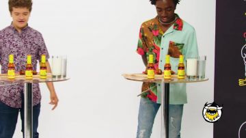 T-shirt of Caleb McLaughlin in Stranger Things' Caleb McLaughlin and Gaten Matarazzo Play Truth or Dab | Hot Ones