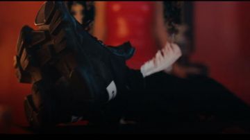 Bottes noires portées par Ski Mask the Slump God dans E-ER Ft. Masque de ski The Slump God, Danny Towers et Lil Yachty