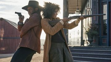Camel long coat worn by Stagecoach Mary (Zazie Beetz) as seen in The Harder They Fall movie