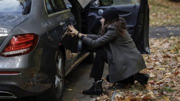 Black boots worn by Elizabeth Keen (Megan Boone) as seen in The Blacklist TV series wardrobe (Season 8 Episode 2)