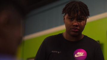 Nikte black t-shirt worn by Phil Aikens (Solomon Irama) as seen in Swagger TV series outfits (Season 1 Episode 2)