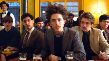 Grey herringbone wool jacket worn by Zeffirelli Timothée Chalamet in The French Dispatch