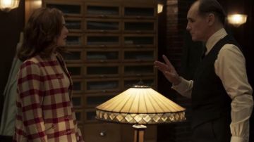 Plaid coat worn by Zoey Deutch as seen in The Outfit movie wardrobe