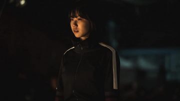 Zip sweater in black with white band worn by Jin Hee-jeong (Re Lee) as seen in Hellbound TV series outfits Season 1 Episode 2