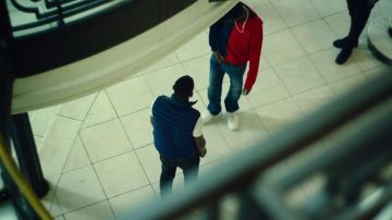 Red and blue sweater worn by Cam (Alexander James Blake) as seen in Topboy TV series outfits (Season 1 Episode 2)
