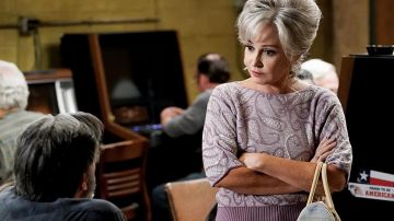 Printed Purple Sweater worn by Connie 'Meemaw' Tucker (Annie Potts) as seen in Young Sheldon TV series outfits (Season 5 Episode 4)