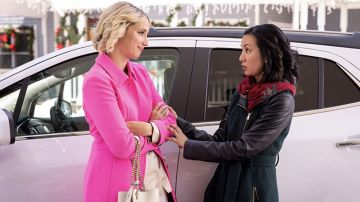 Pink coat worn by Molly Gallant (Molly McCook) as seen in Candy Coated Christmas movie outfits