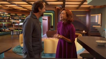 The purple dress worn by Elsa Zylberstein in the movie Bigbug