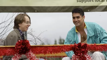 Turquoise belted jacket worn by Stéphane (Avan Jogia) as seen in The Exchange movie wardrobe