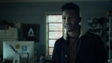 Orange (confetti/textured) crewneck sweater worn by Dan Turner (Mamoudou Athie) in Archive 81 TV Show wardrobe (Season 1 Episode 7)