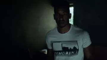 Rooftop Films White T-shirt worn by Dan Turner (Mamoudou Athie) as seen in Archive 81 TV show (Season 1 Episode 7)
