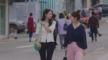 Green handbag worn by Yoon Hye Jin (Shin Min-a) in Hometown Cha-Cha-Cha TV series outfits (Season 1 Episode 2)