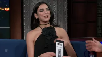 Black dress worn by Dua Lipa as seen in The Late Show with Stephen Colbert on February 3, 2022