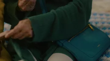 Fossile sac à main en vert porté par Jennifer Peterson (Dianne Wiest) comme on le voit dans I Care a Lot film