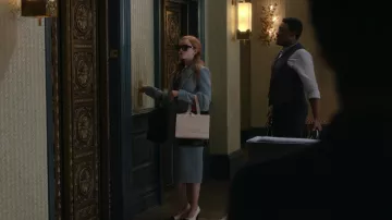 Grey Long Coat worn by Anna Delvey (Julia Garner) as seen in Inventing Anna Wardrobe (S01E05)