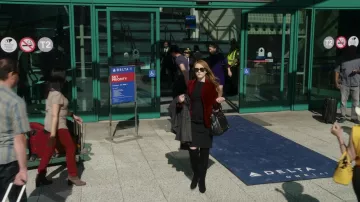Black Velvet Boots worn by Anna Delvey (Julia Garner) as seen in Inventing Anna TV series (S01E08)