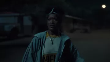 White and Yellow sweater worn by Jill Haywood (Keke Palmer) as seen in Nope movie