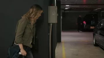Olive green jacket worn by Andy Oliver (Bella Heathcote) as seen in Pieces Of Her outfits (Season 1)